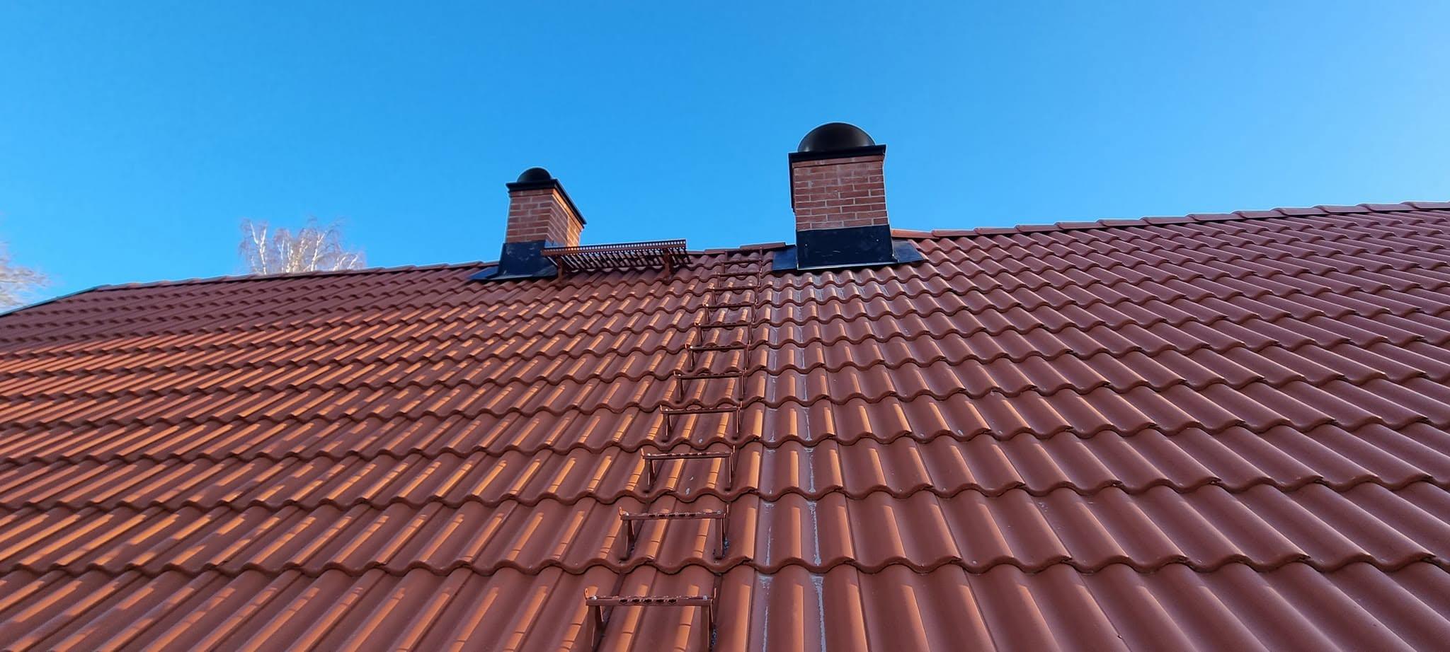 New tiled roof with two chimneys, new flashing and roof ladder